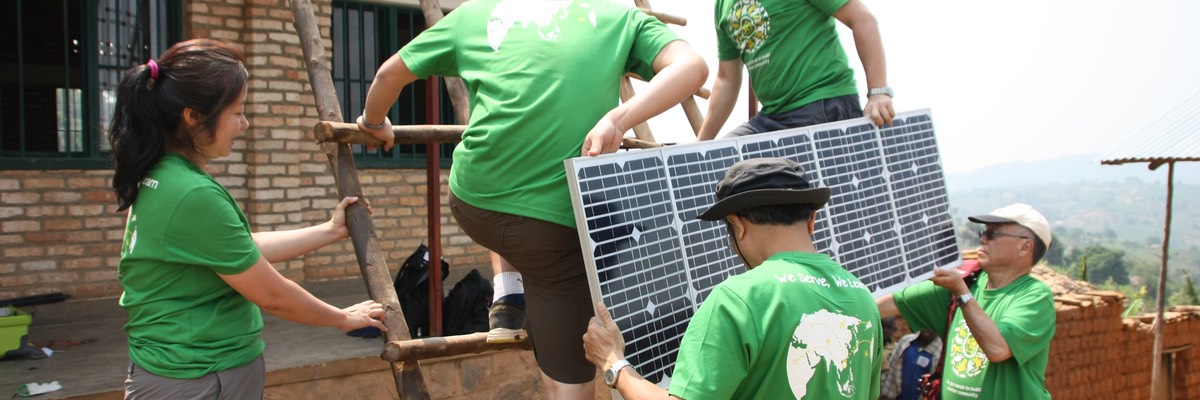 Installing the solar panels. These 5 panels don’t look like much, but they’ll fully charge the suitcase in one morning in Rwanda.